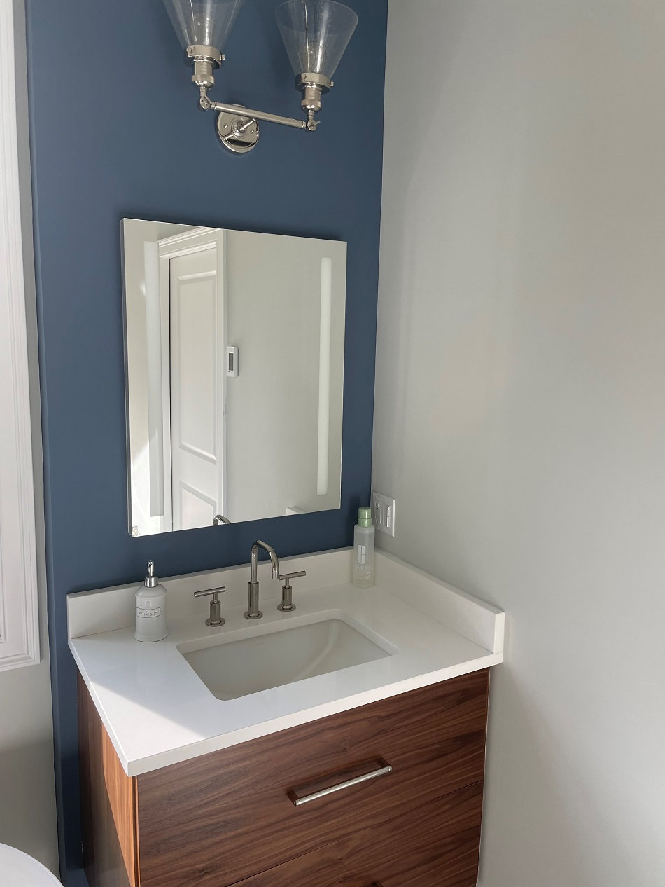 Quartz vanity top on a walnut bathroom vanity by Pistritto Marble Imports in Hartford, CT