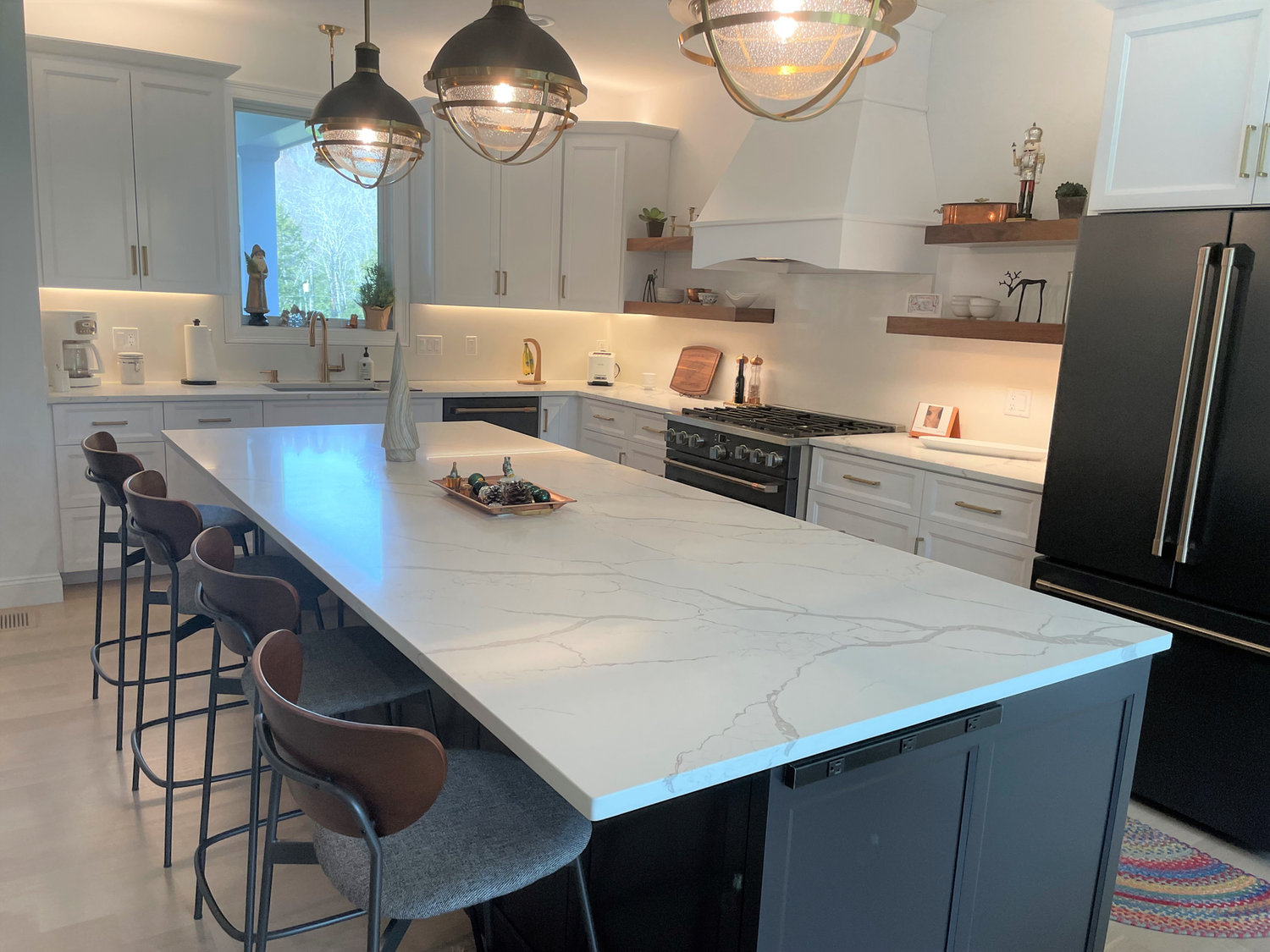 White quartz kitchen island with seating by Pistritto Marble Imports in Hartford, CT