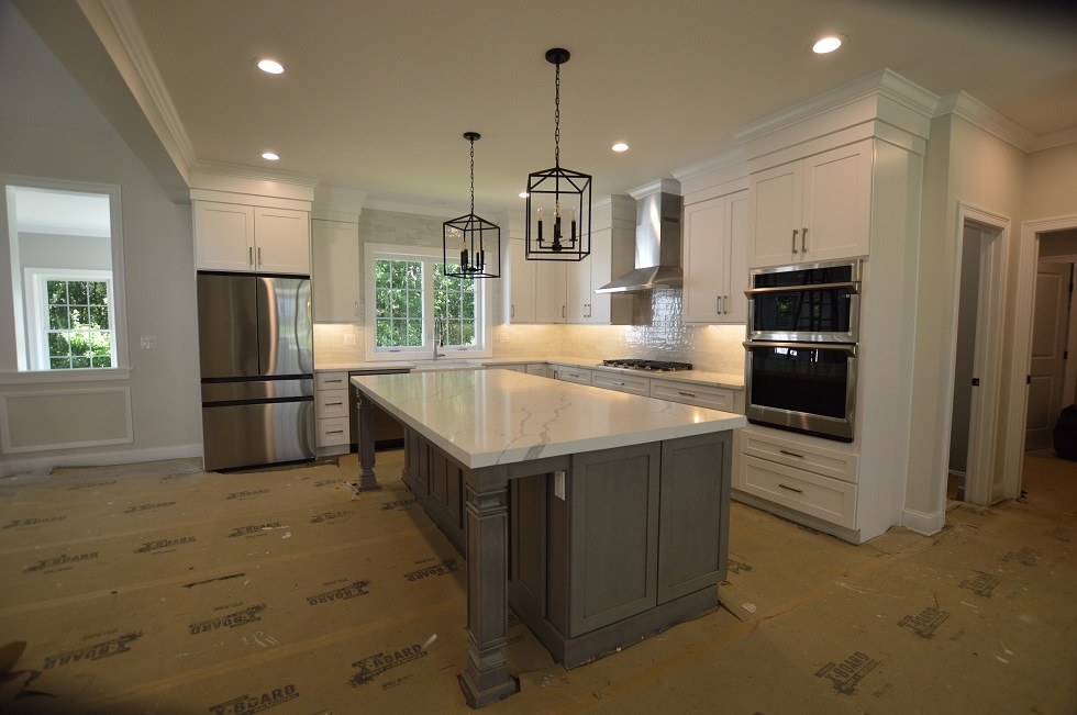 Calacatta Laza quartz kitchen island and perimeter countertops by Pistritto Marble Imports in Hartford, CT